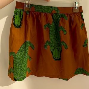 Tan and green  Mini Rodini crocodile skirt, size 116/122.